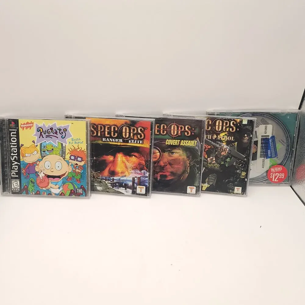Playstation Lot of 25 Games Spec Ops Sno Cross Asteroids Cyber Tiger Test Drive